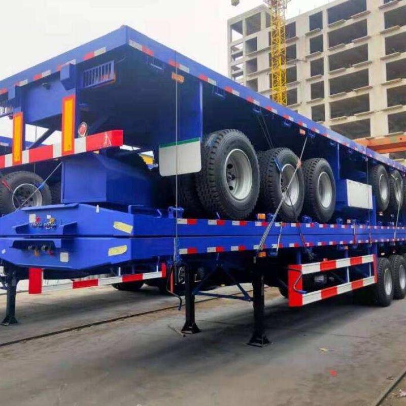 Tarzan 40-Ton 3-Axle Steel Flatbed Semi-Trailer for 20ft/40ft Container Transport