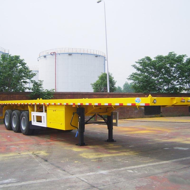 Tarzan 3-Axle 60-Ton Steel Flatbed Semi-Trailer for 40ft Container Transport
